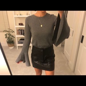 Grey top with flared sleeves